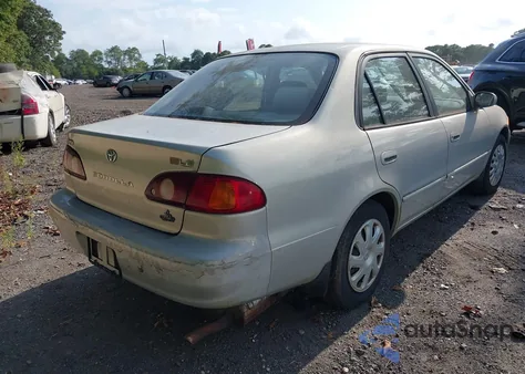 2002 Toyota Corolla Le z USA, uszkodzony, nr VIN 1NXBR12E12Z612437